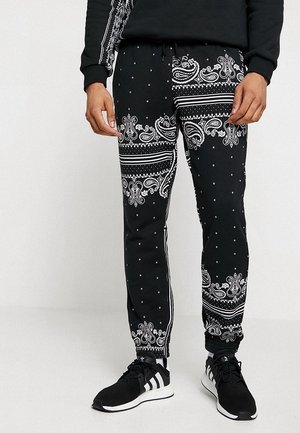 Pantalones deportivos - black