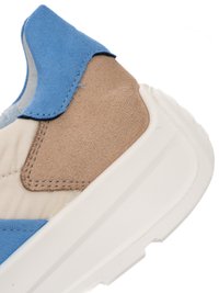 Sneaker heel with beige suede, blue suede accents, cream fabric, and a thick white rubber sole.