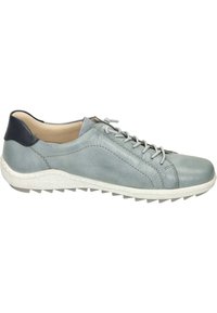 Light blue leather sneaker with a padded navy heel, white textured sole, and grey laces. Features a smooth finish and slight stitching details.