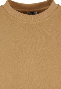 Cremefarbener Sweatshirt mit ribbeltem Ausschnitt, aus weichem Stoff, mit glatter Textur und zurückhaltendem Design.