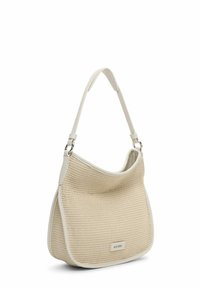 Borsa tote in tessuto beige con bordatura in pelle color crema liscia e tracolla regolabile. Presenta un logo goffrato discreto sulla parte anteriore.