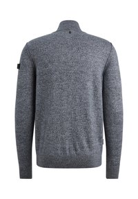Gray knit sweater with high collar, long sleeves, and ribbed hem. Features a small black tag on the left sleeve. Soft, textured fabric.