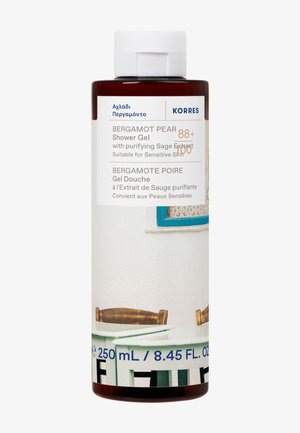 Gel douche Bergamote Poire dans une bouteille ambre foncé. Présente une étiquette blanche avec du texte bleu, incluant des détails sur les ingrédients et la taille.