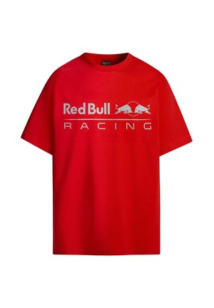 Crvena pamučna majica s velikim bijelim logotipom "Red Bull Racing" i dva stilizirana bika, s okruglim izrezom i kratkim rukavima.