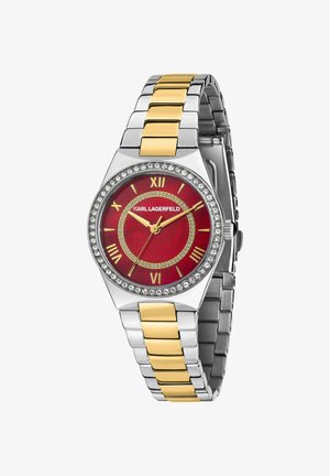 Orologio in metallo tono argento e oro con quadrante rosso, numeri romani e dettagli in cristallo. Dotato di bracciale in acciaio inox con rifiniture dorate.