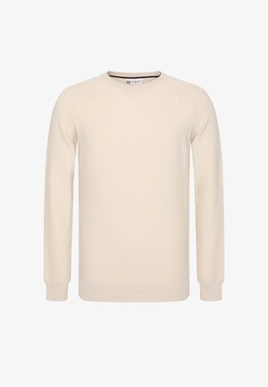 Vaaleankermanvärinen neulepaita, jossa on teksturoitu timanttikuvio, pyöreä kaula-aukko ja pitkät hihat. Varustettu joustavuudeltaan tiukoilla resoreilla hihoissa ja helmassa.