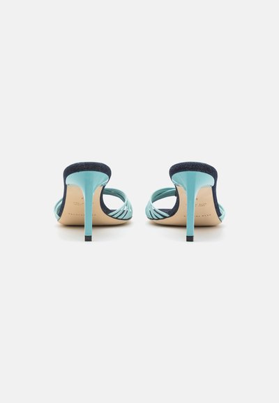 Open-toe high heels featuring a turquoise strap design with navy accents, a glossy finish, and a stiletto heel with a black tip.