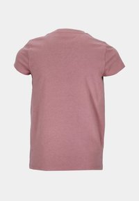 T-shirt a maniche corte in cotone rosa pallido con scollatura rotonda. Design semplice, senza motivi o accenti visibili sul retro.