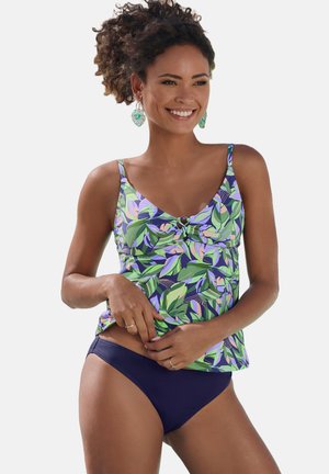 Tankini swimsuit with colorful leaf pattern in green, purple, and blue; paired with dark navy bikini bottoms. Features adjustable straps.