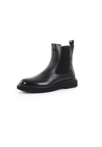 Stivale Chelsea in pelle nera con pannelli laterali elasticizzati, linguetta per una facile indossabilità e suola in gomma spessa. Texture liscia con punta arrotondata.