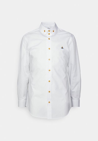 White long-sleeve shirt made from cotton, featuring orange buttons, a button-down collar, and a small embroidered logo on the left chest.