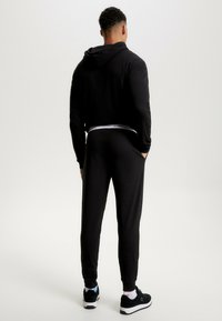 Tommy Jeans HERITAGE BADGE - Pyjamasbukse - black