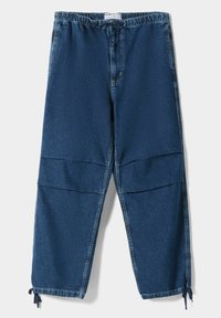 Jeans i mörkblått med elastisk midja, två stora framfickor och dragsko vid nederkanten för justerbar passform.