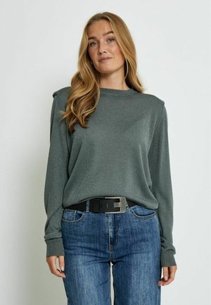 Gray long-sleeve sweater with a crew neck and textured fabric, paired with blue jeans and a black belt with a rectangular buckle.
