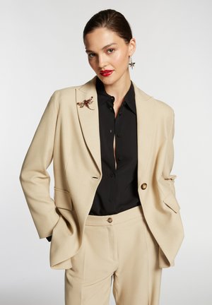 STRETCH - Kurzmantel - beige