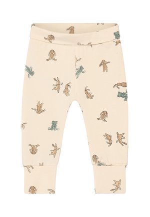 Babypant in crèmekleur met een all-over print van kleine bruine konijntjes en groene teddyberen in verschillende houdingen.