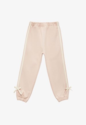 Różowe dresy z białymi paskami po bokach, elastycznym paskiem w talii oraz ściągaczami na rękawach z małymi kokardkami przy każdym kostce. Miękki, dresowy materiał.