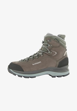 Hiking boot made of brown suede with gray accents. Features durable rubber sole, metal lace hooks, and padded ankle support.