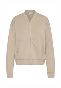 Beige zip-up bomber jacket made of soft fabric, featuring a round collar, two front pockets, and ribbed cuffs and hem.