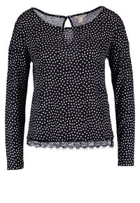 Czarna bluzka z długim rękawem z małymi białymi serduszkami, koronkowym wykończeniem na dole i zapięciem na guzik w kształcie łezki na plecach.