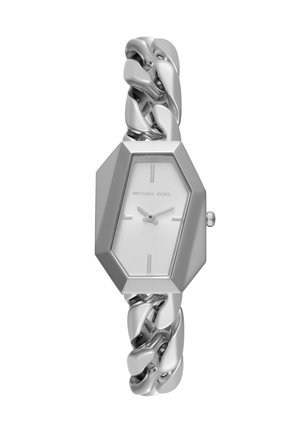 Zilveren Michael Kors polshorloge met een zeshoekige wijzerplaat en een grove schakelkettingarmband, minimale uurmarkeringen en drie wijzers.