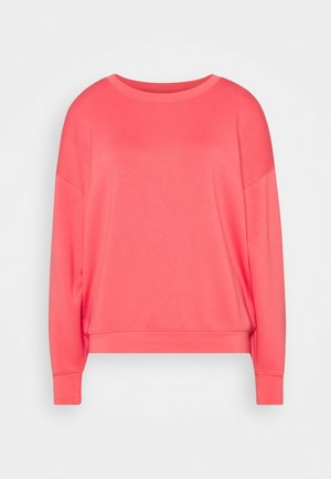 Coral sweatshirt with long sleeves, round neckline, and ribbed cuffs. Soft fabric with a relaxed fit, featuring a single color throughout.