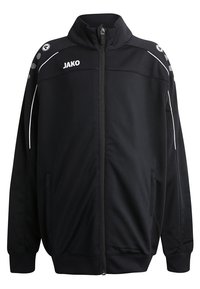 Zwarte sportjas met hoge kraag, rits aan de voorkant, witte accenten en zijzakken. Voorzien van een logo op de borst en een gestreept schouderdetail.