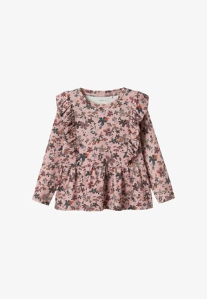 Bluză din bumbac roz, cu mânecă lungă, prezentând un model floral în diverse culori, cu accente volate pe umeri și un tiv tip peplum.