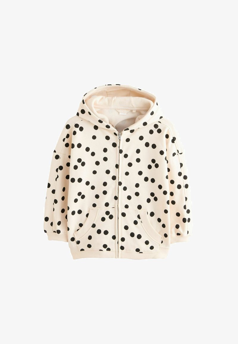 Kremowa bluza dziecięca na zamek błyskawiczny z czarnymi kropkami, przednimi kieszeniami, ściągaczami na mankietach i kapturem.