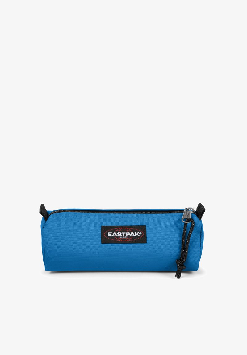 Blue pouch made of durable fabric with a zip closure, feature logo patch, and black accents. Smooth texture, cylindrical shape.