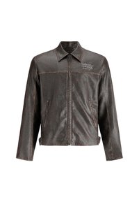 Brown leather jacket with a collar, front zipper, and two side pockets. Features contrast stitching and "DON'T HARD" embroidery on the chest.