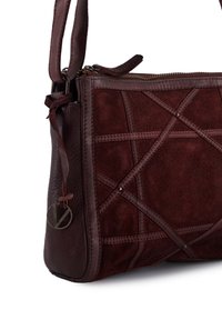 Burgundy leather and suede handbag with crosshatch stitching, a zip closure, and a small round emblem. Features an adjustable shoulder strap.