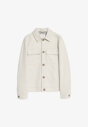 Veste boutonnée beige clair avec un col, deux poches à rabat sur la poitrine et des boutons marron à l'avant et aux poignets.