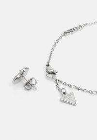Boucles d'oreilles GUESS Femme en Acier Argenté et Zircon - JUBE02168JWRH