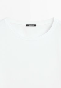 White crew neck t-shirt with a black label inside the collar reading "Massimo Dutti Made in Portugal."