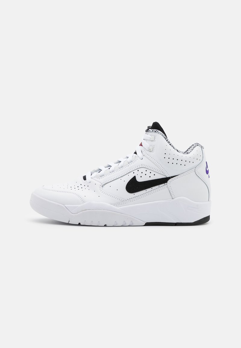 White high-top sneakers with black Nike swoosh, perforated detailing, and textured accents. Features a black and purple logo at the heel.