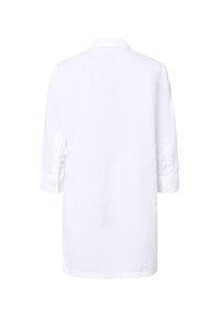 Witte, geknoopte blouse met driekwart mouwen, knoopmanchetten en een ontspannen silhouet. Gemaakt van een textuurstof. Eenvoudig ontwerp.