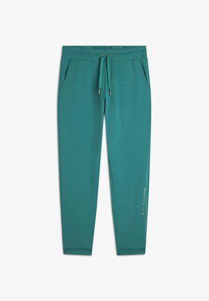 Pantalones de chándal en verde azulado con cintura elástica y cordón, dos bolsillos laterales y un detalle impreso en la pierna izquierda. Tela suave y lisa.