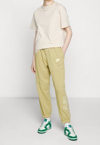 Nike Sportswear Žerzejové šaty - beige