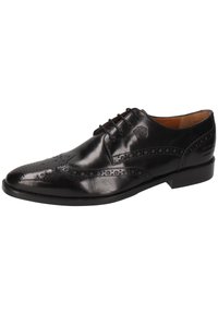 Scarpa oxford in pelle nera con punta appuntita, design con lacci e dettagli brogue lungo il bordo superiore e la punta. Finitura liscia.