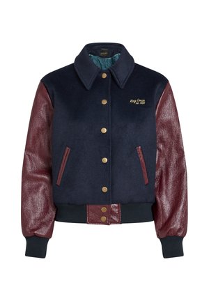 Navy blue bomber jacket with maroon leather sleeves, gold snap buttons, ribbed cuffs, and waistband; features side pockets and logo detail.