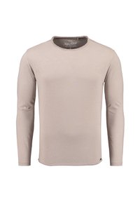 Lange mouwen shirt in licht beige, gemaakt van zachte stof. Heeft een ronde halslijn en een gladde textuur, met minimale stikdetail.