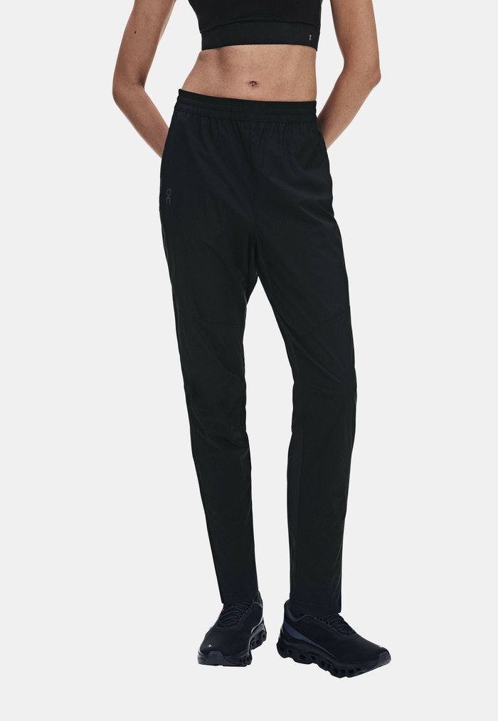 On WEATHER PANTS - Tracksuit bottoms - black