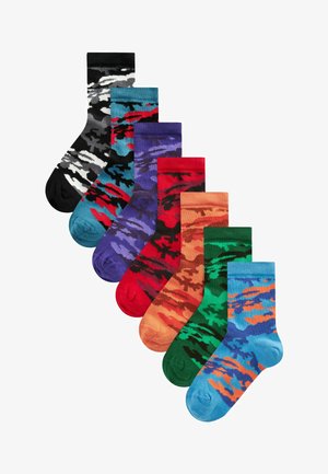 Set of seven camo-patterned socks in various colors: black, blue, purple, red, orange, green, and gray. Made of soft, stretchy fabric.