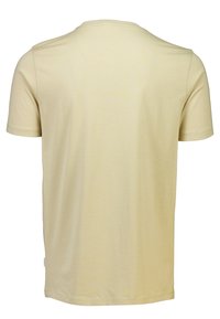 Ljusgul t-shirt med kort ärm, tillverkad av mjukt material. Har rund halsringning och rak fåll. Minimalistisk design, inga mönster eller grafik.