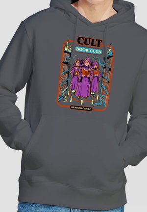 Three robed figures reading books in a library aisle with candles and tentacles, labeled "Cult Book Club Reading Circle" on a dark hoodie.