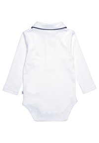 Hvit langermet bodies med polo-krage og marineblå detaljer. Laget av myk stoff, har en trykknapp-lukking nederst.