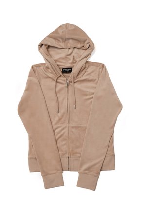 Felpa con zip beige realizzata in morbido tessuto velour. Presenta un cappuccio, tasche frontali e polsini a coste. Logo sottile ricamato sul petto.