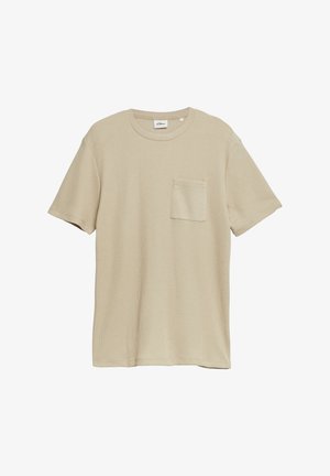 T-shirt beige à manches courtes texturé avec col rond et petite poche poitrine, présenté sur fond blanc.