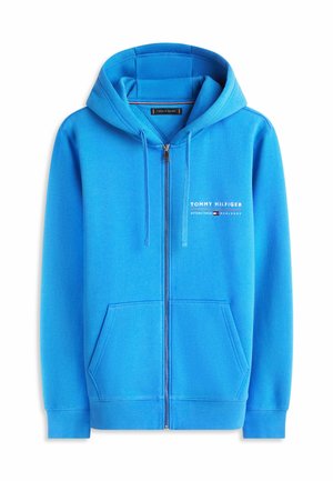 Blauer Kapuzenpullover mit durchgehendem Reißverschluss, Fronttaschen, Kordelzugkapuze und "Tommy Hilfiger"-Logo auf der linken Brust.